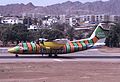 The artwork of a flying fish covering the aircraft is considered incidental (DR)